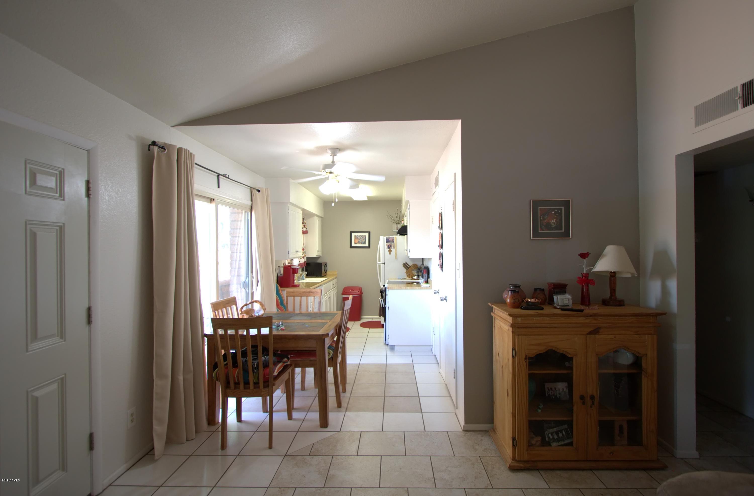 6427 South Newberry Road, Unit B Tempe, AZ 85283 - Photo 7 of 13 Dining kitchen side