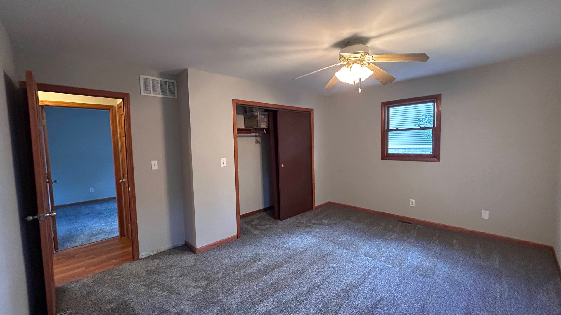 745 Longlane Road New Lenox, IL 60451 - Photo 10 of 17 an empty room with closet and windows
