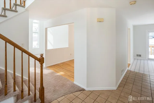 a view of an entryway with staircase