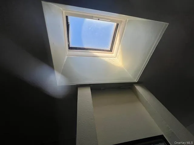 a view of a hallway with window