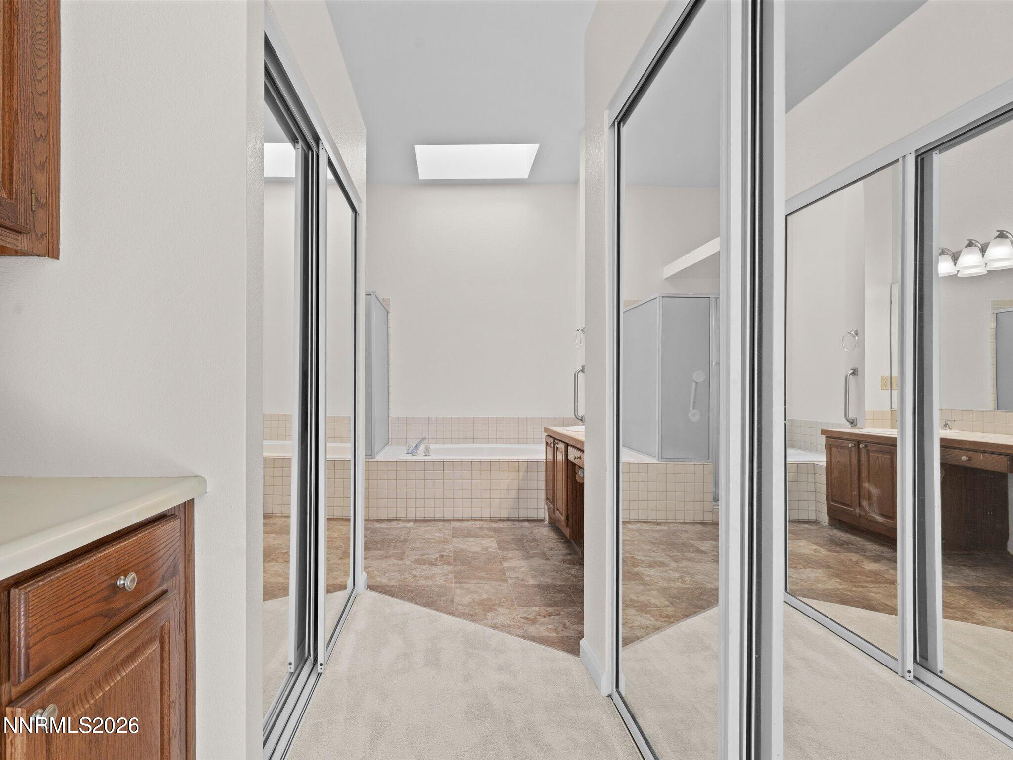 1280 Bridlewood Way Reno, NV 89509 - Photo 27 of 57 a bathroom with a shower and a sink