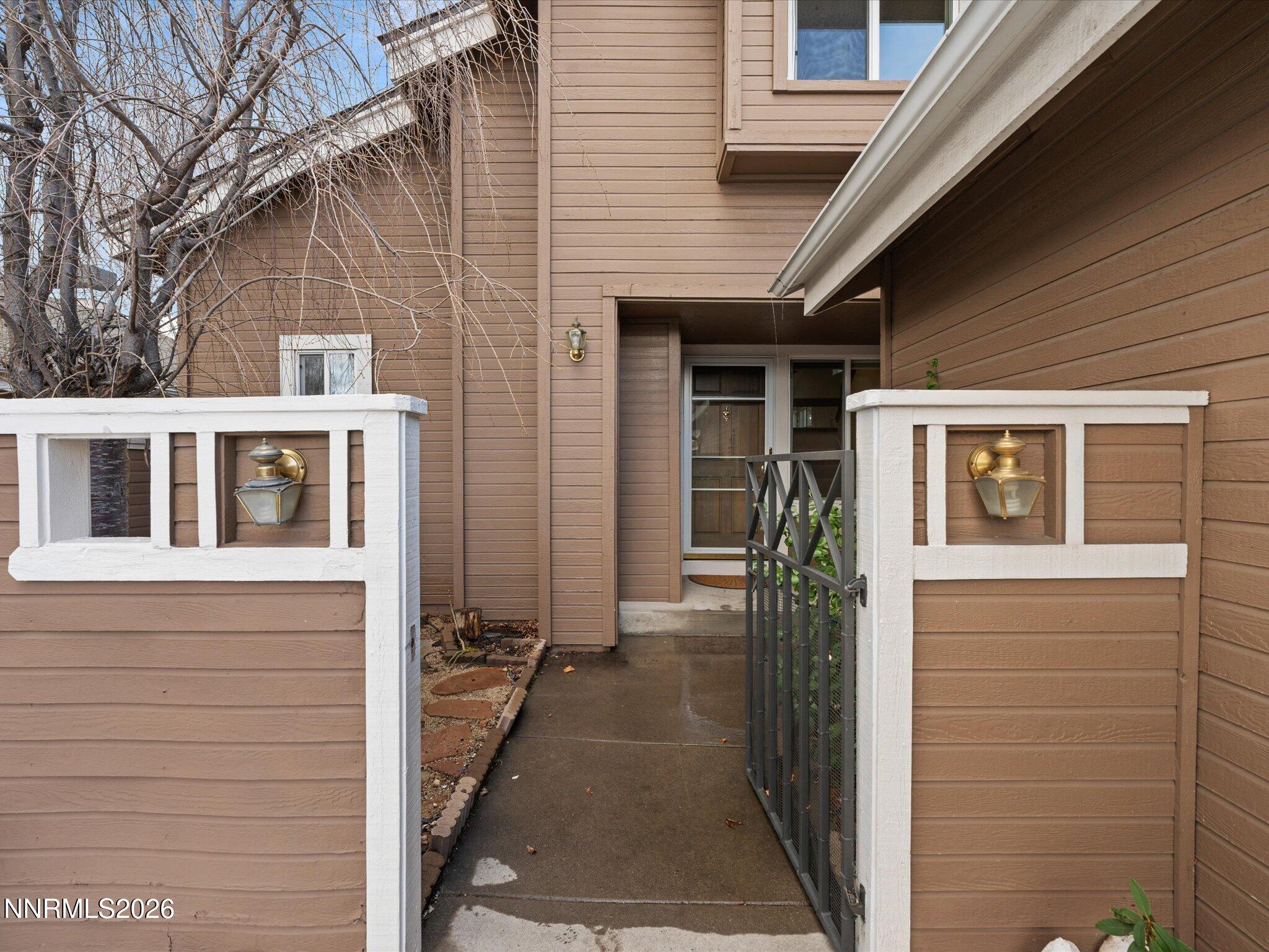 1280 Bridlewood Way Reno, NV 89509 - Photo 3 of 57 a view of a house with a car park side of house