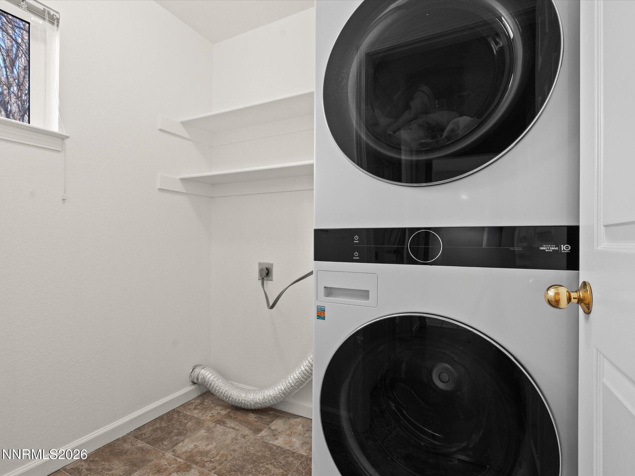 1280 Bridlewood Way Reno, NV 89509 - Photo 32 of 57 a utility room with dryer and washer