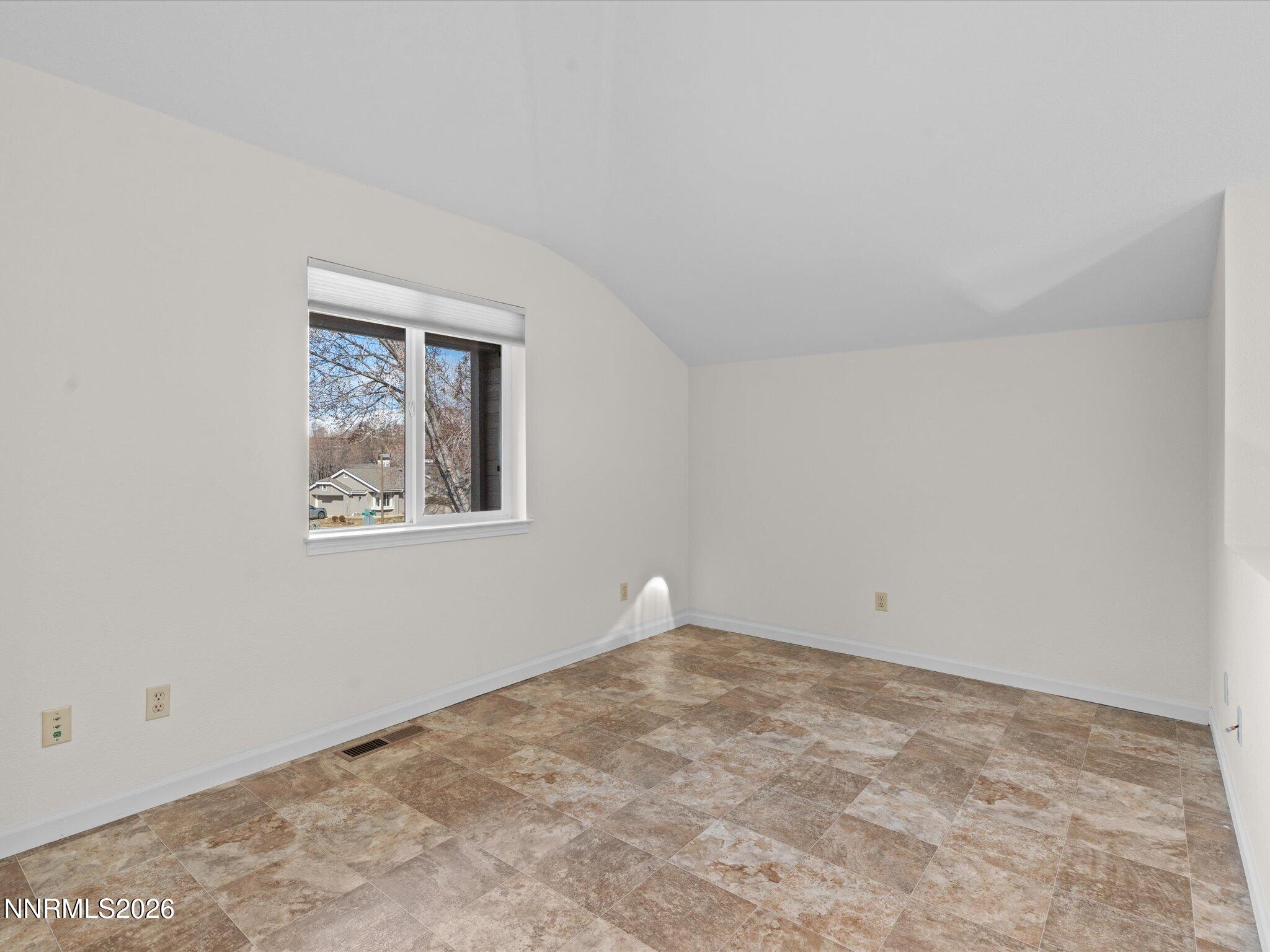1280 Bridlewood Way Reno, NV 89509 - Photo 36 of 57 a view of an empty room with a window