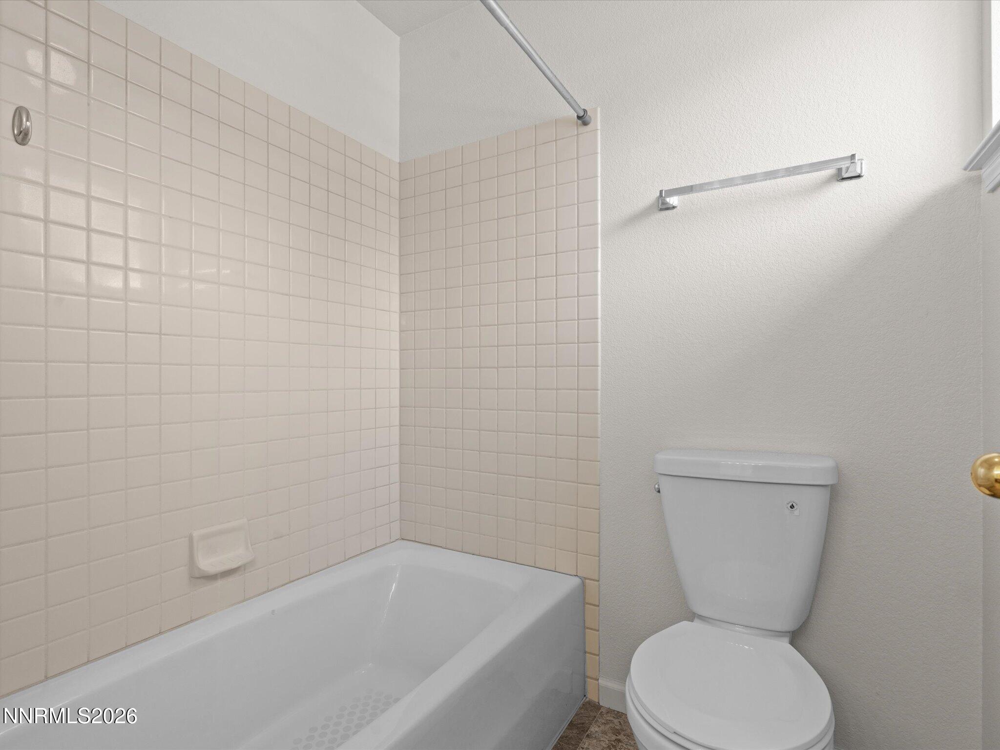 1280 Bridlewood Way Reno, NV 89509 - Photo 41 of 57 a bathroom with a toilet and shower