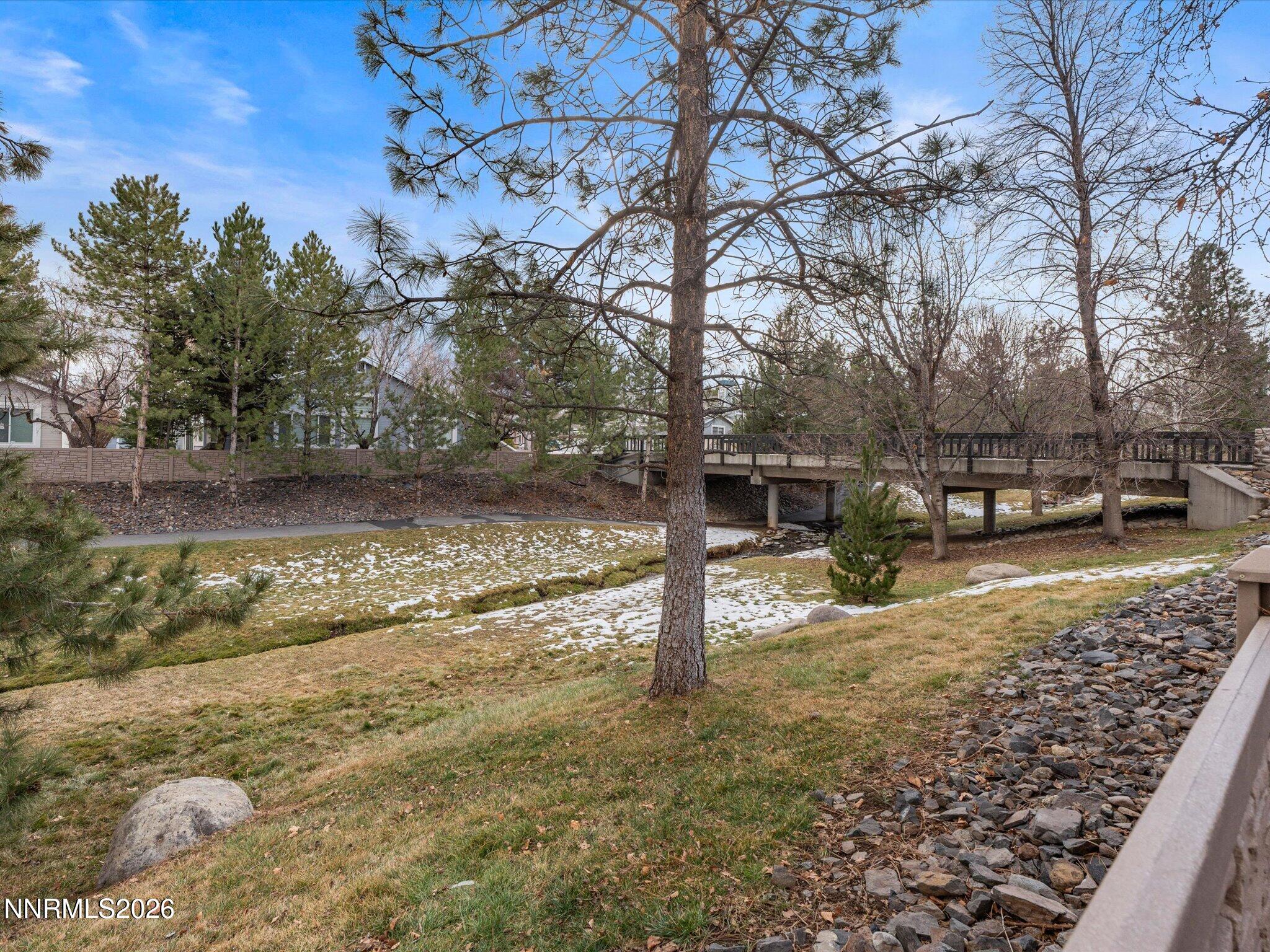 1280 Bridlewood Way Reno, NV 89509 - Photo 47 of 57 a view of a yard with wooden fence