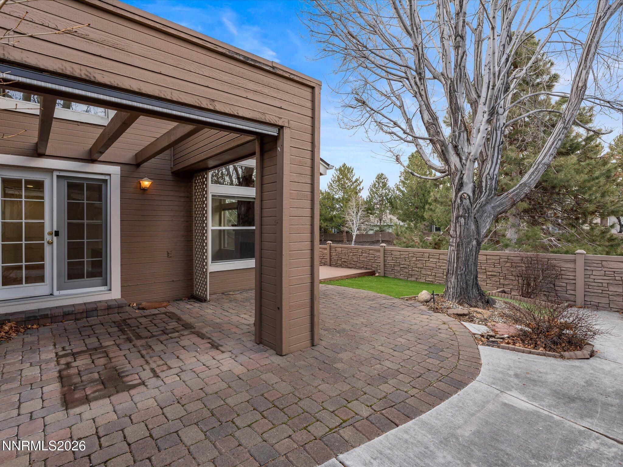 1280 Bridlewood Way Reno, NV 89509 - Photo 49 of 57 a view of a porch with a backyard