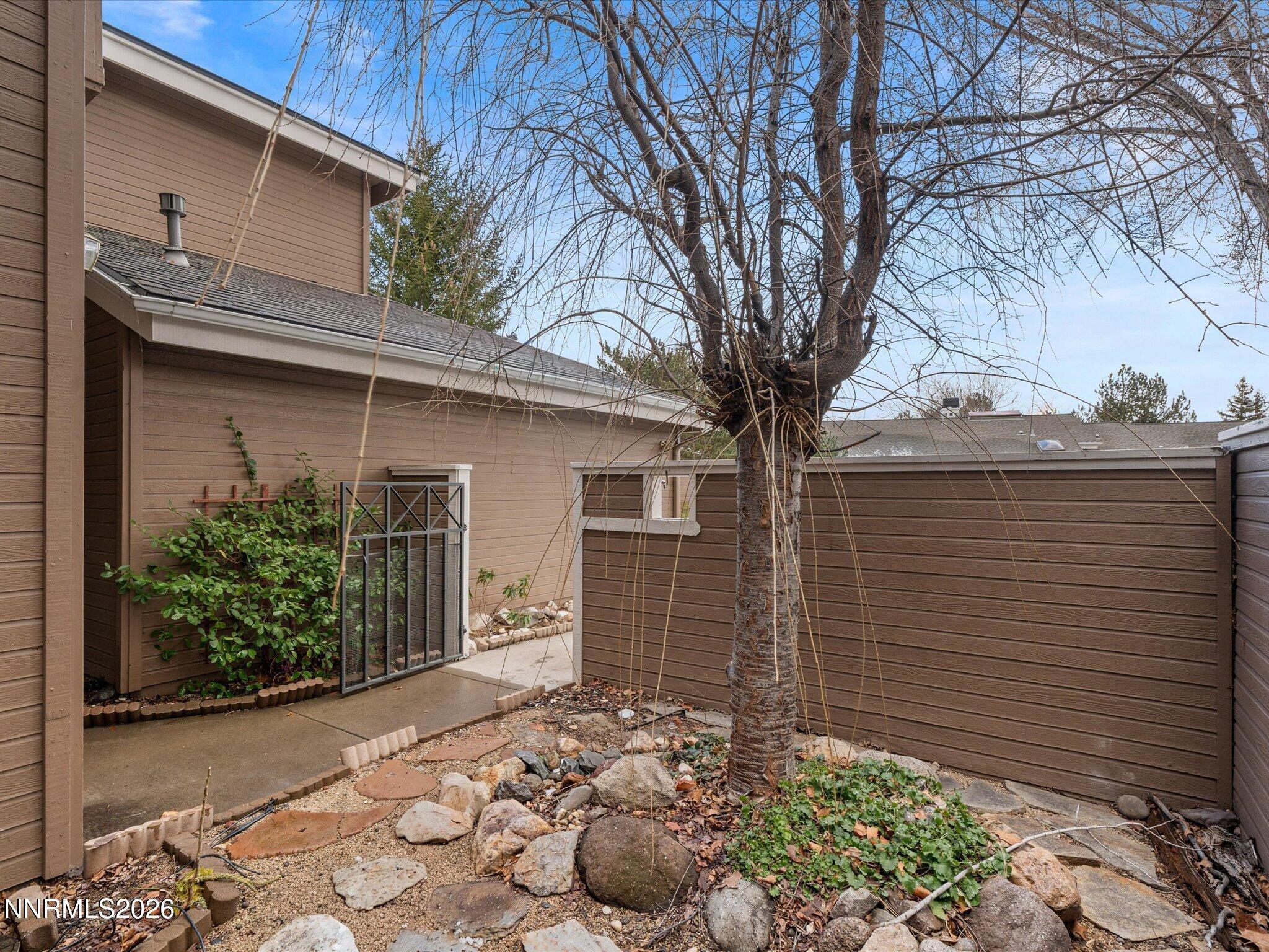 1280 Bridlewood Way Reno, NV 89509 - Photo 5 of 57 a view of a house with a yard