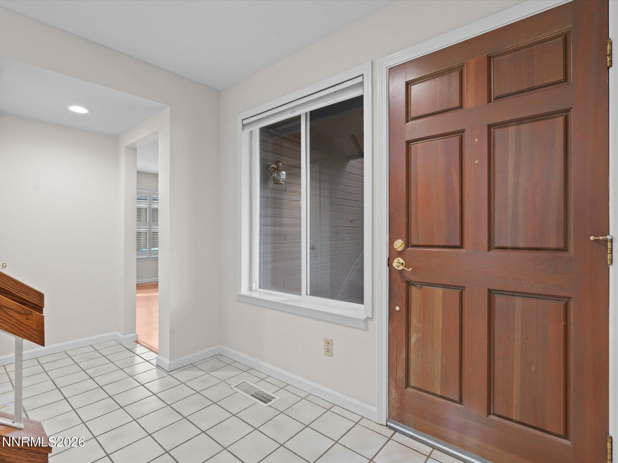 1280 Bridlewood Way Reno, NV 89509 - Photo 7 of 57 an empty room with windows