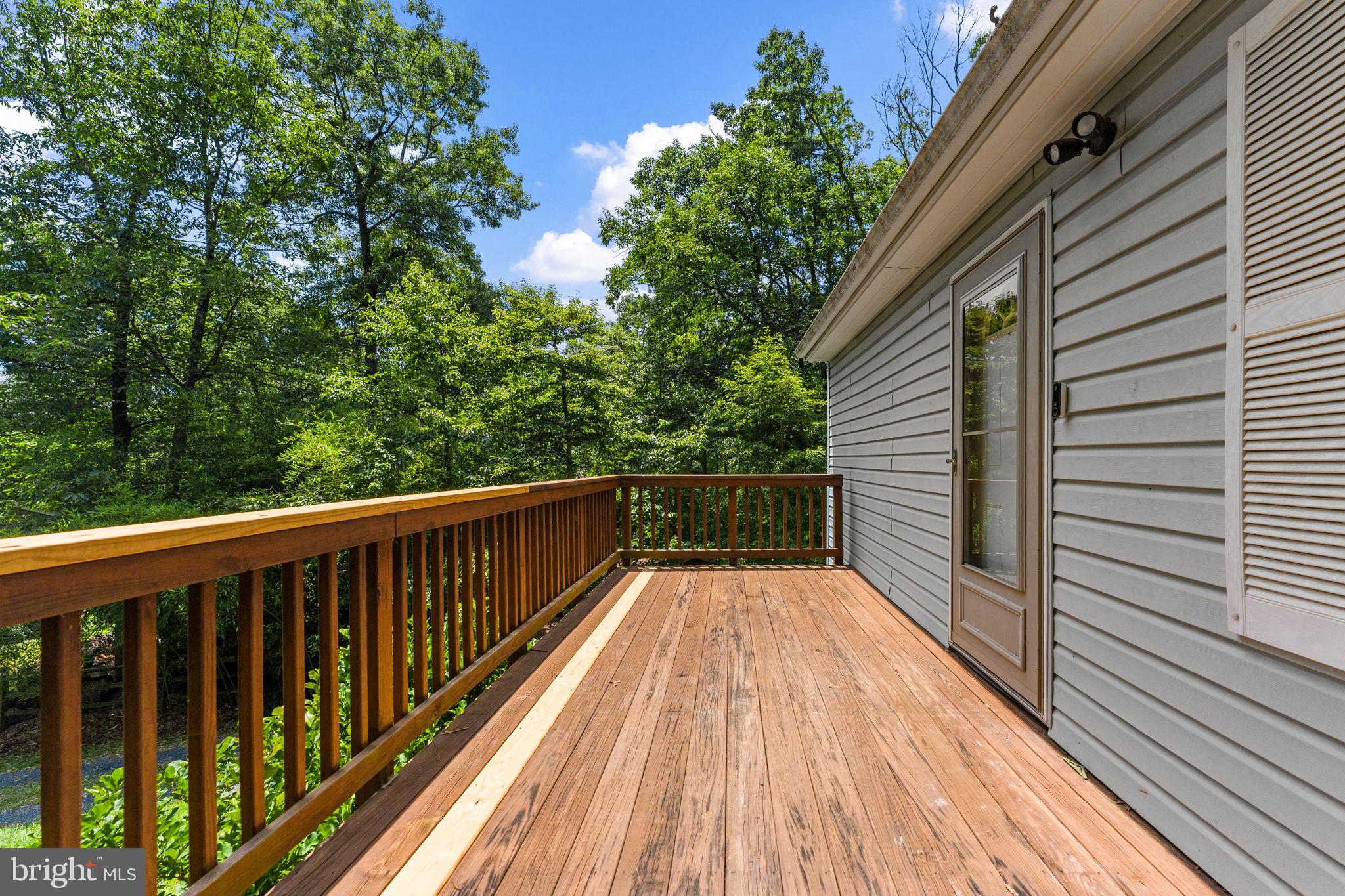 111 Geronimo Trail Winchester, VA 22602 - Photo 5 of 43 Expansive deck to enjoy the peaceful surroundings