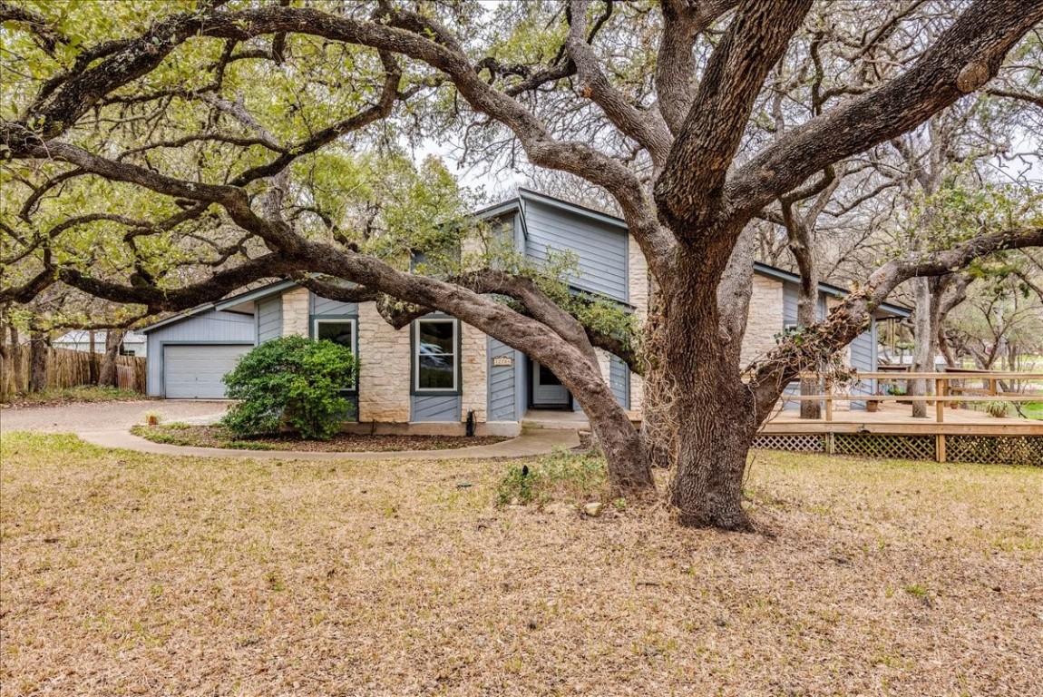 a house with trees in front of it