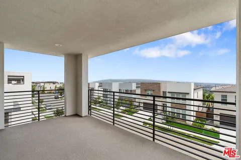 a view of a terrace with hardwood