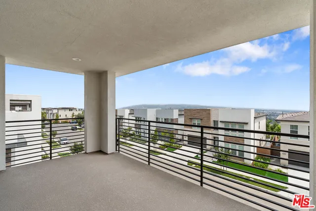 a view of a terrace with hardwood