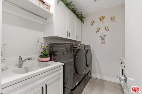 a bathroom with a sink and toilet