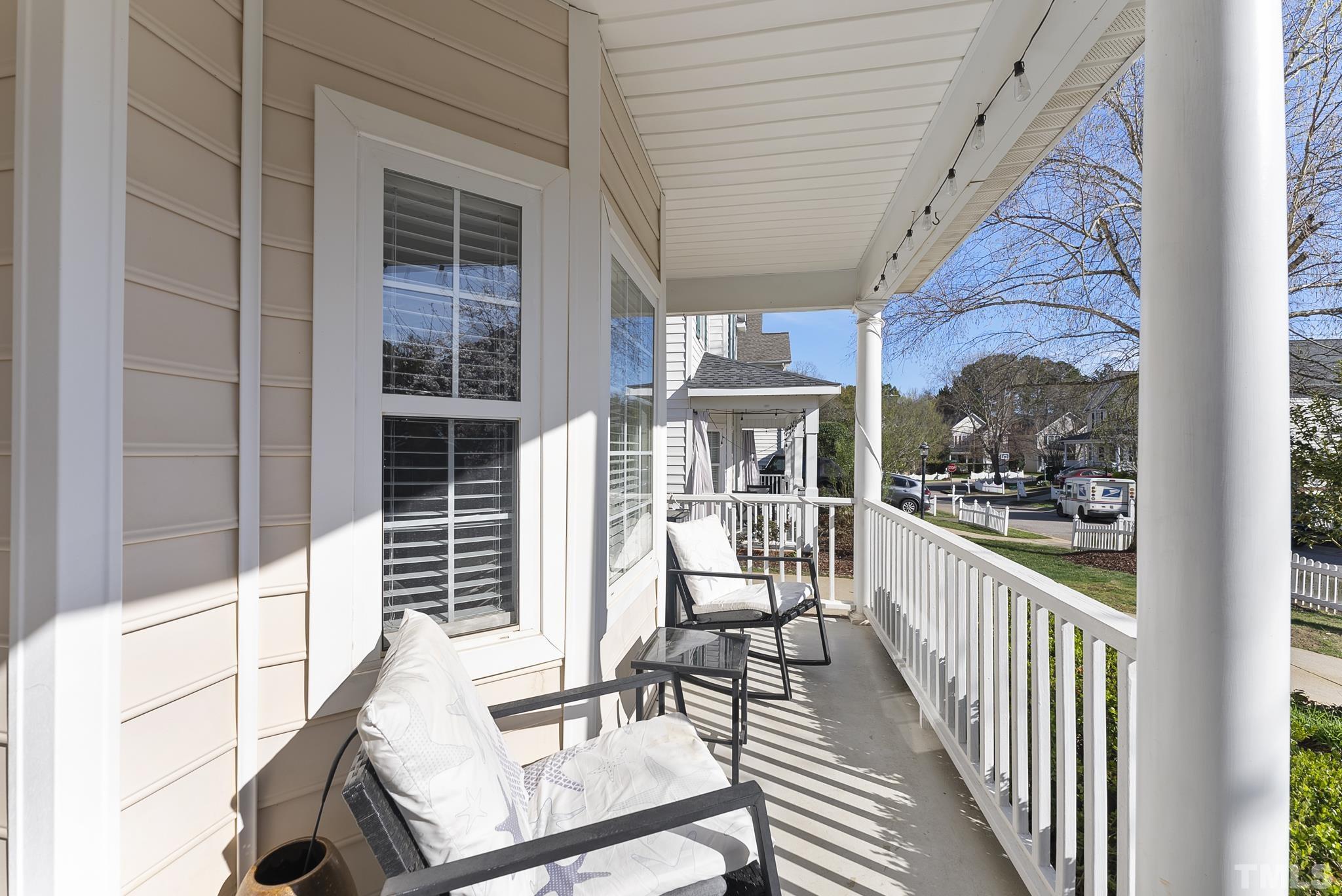 5016 Village Lawn Drive Raleigh, NC 27613 - Photo 21 of 27 a view of a balcony with chairs