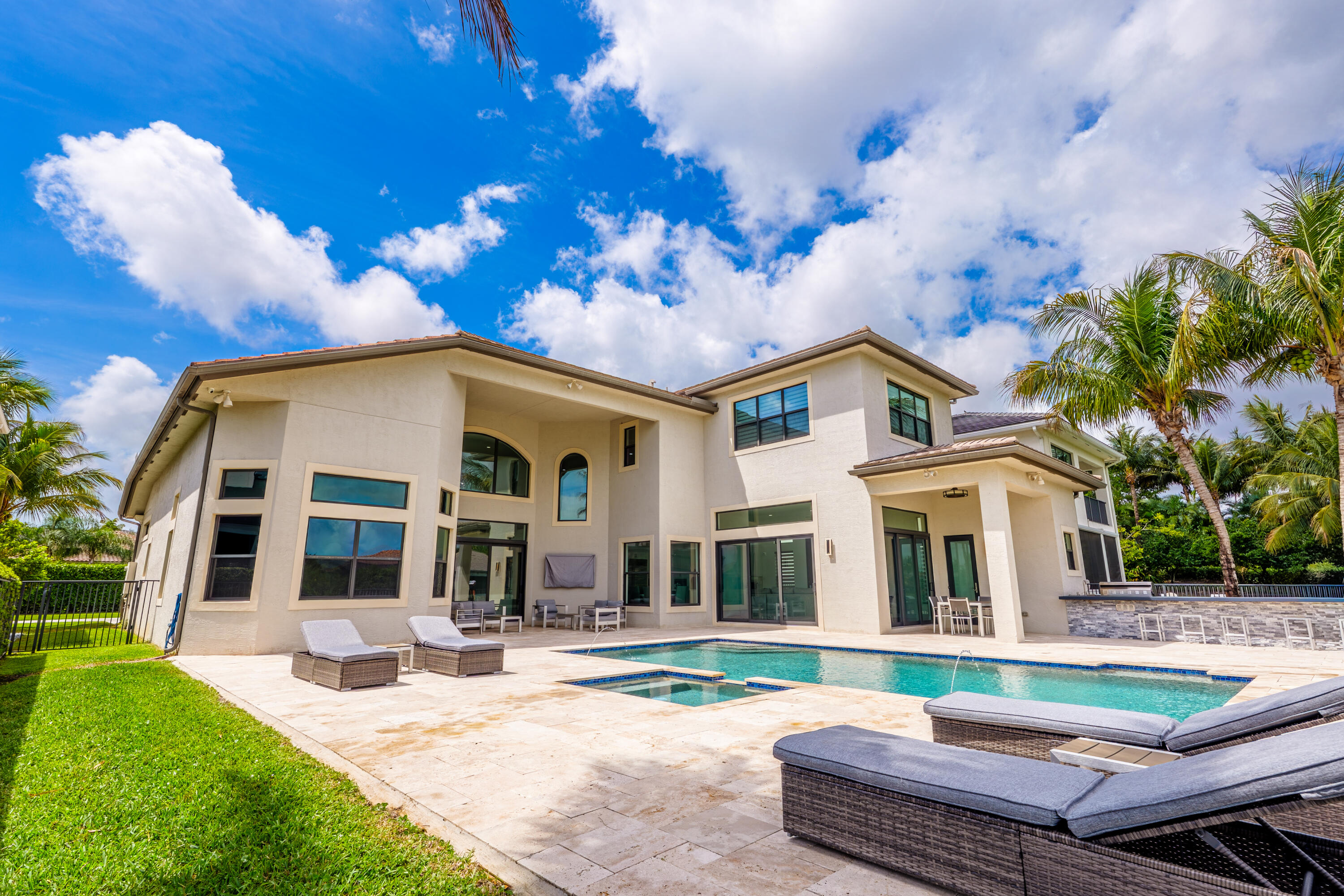 9801 Rennes Lane Delray Beach, FL 33446 - Photo 2 of 77 a view of house with yard and entertaining space