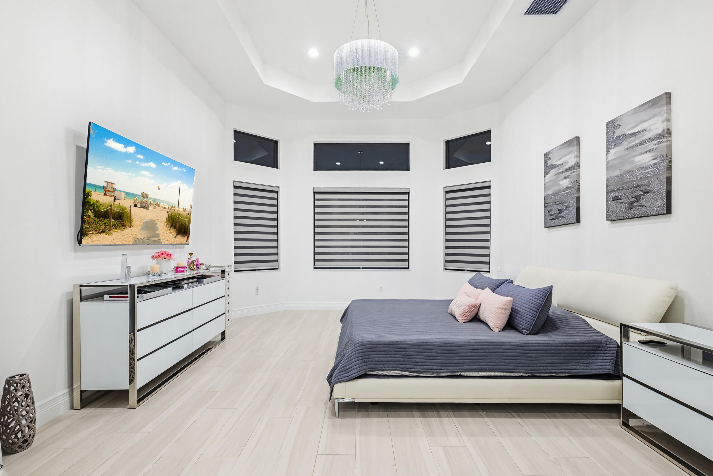 9801 Rennes Lane Delray Beach, FL 33446 - Photo 26 of 77 a living room with furniture and a flat screen tv