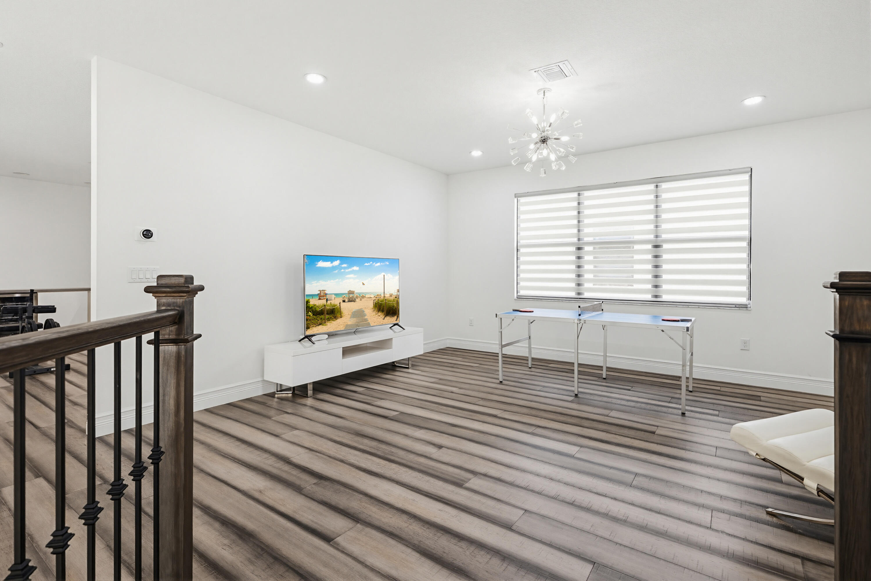 9801 Rennes Lane Delray Beach, FL 33446 - Photo 39 of 77 a bedroom with furniture window and a ceiling fan