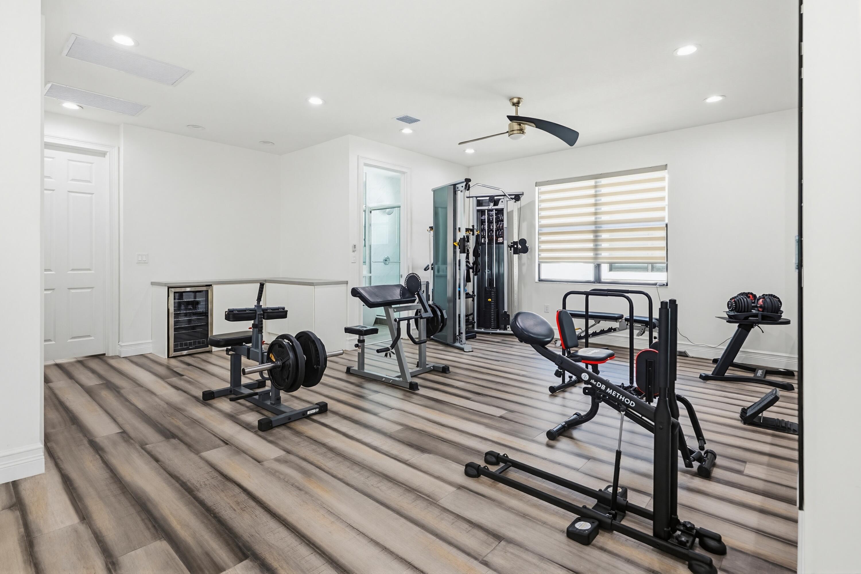9801 Rennes Lane Delray Beach, FL 33446 - Photo 49 of 77 a view of a room with gym equipment