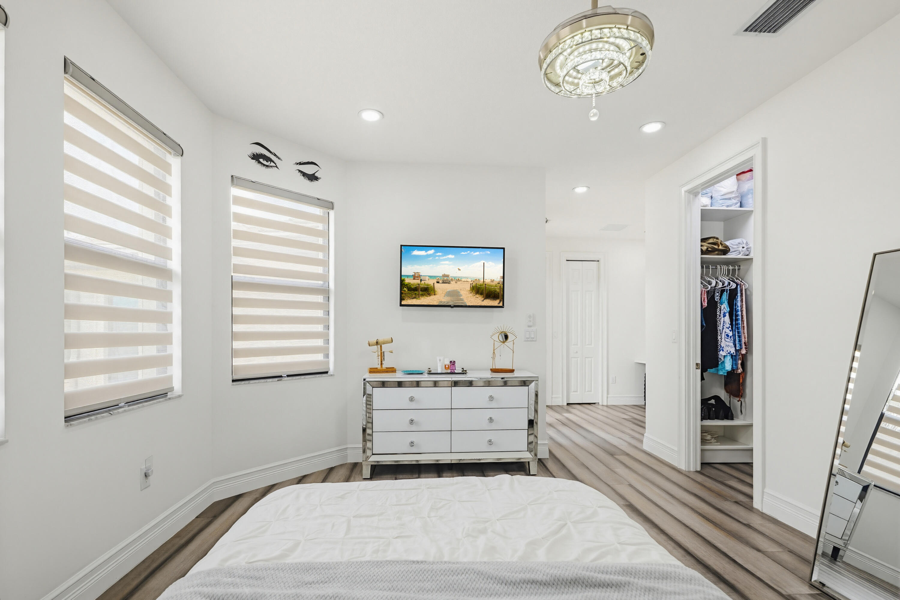 9801 Rennes Lane Delray Beach, FL 33446 - Photo 60 of 77 a bedroom with a bed and a window