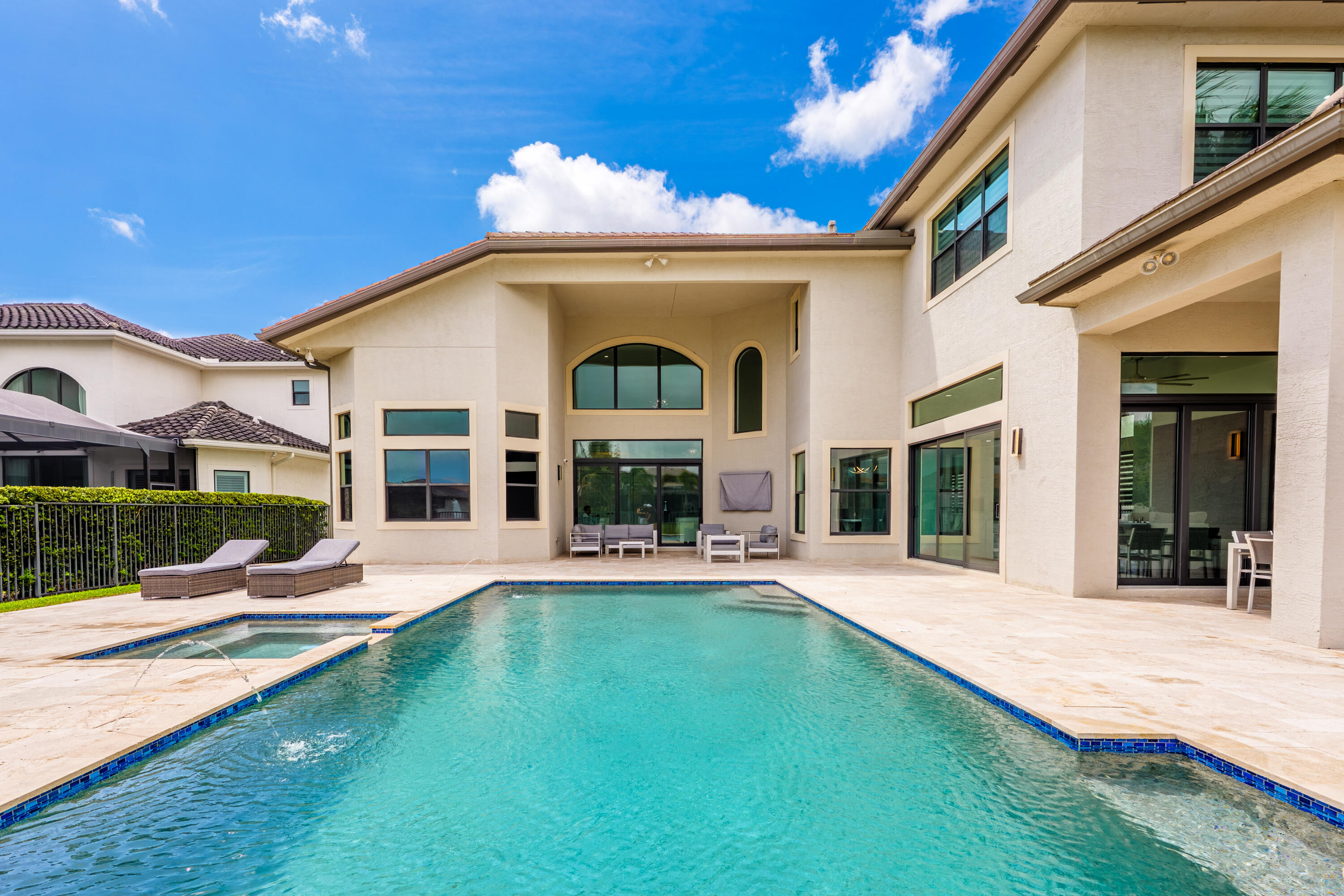 9801 Rennes Lane Delray Beach, FL 33446 - Photo 64 of 77 a view of a house with a swimming pool