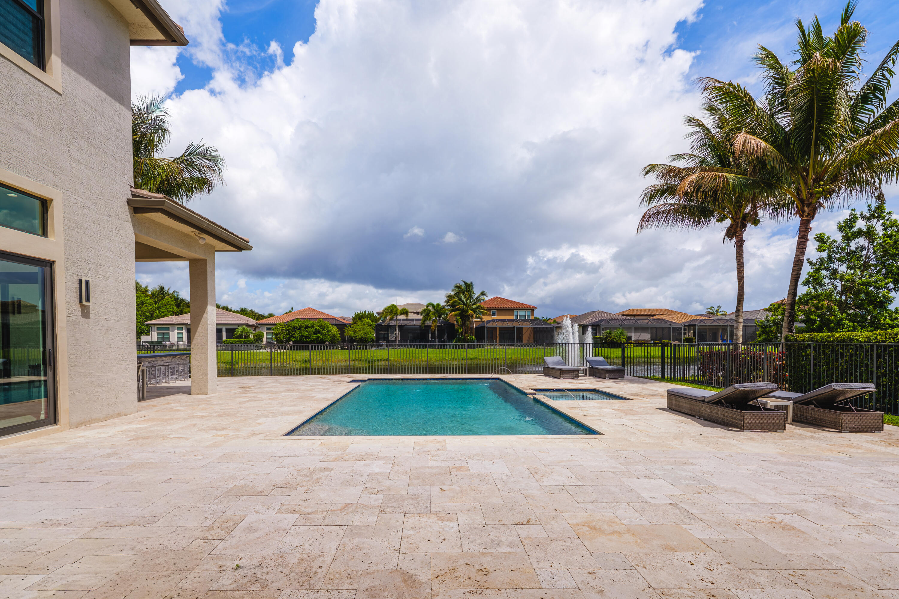 9801 Rennes Lane Delray Beach, FL 33446 - Photo 70 of 77 a view of outdoor space with swimming pool and furniture