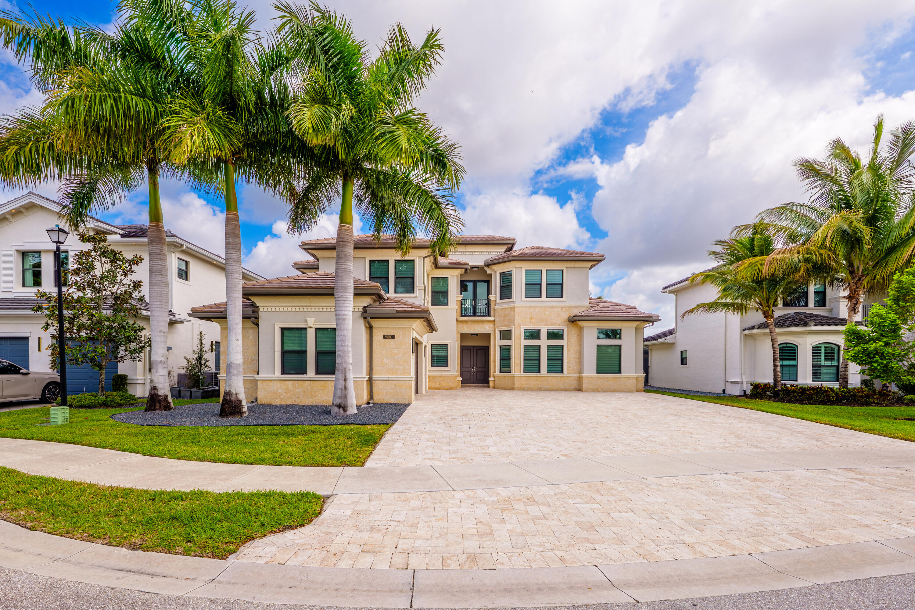 9801 Rennes Lane Delray Beach, FL 33446 - Photo 77 of 77 a front view of multiple houses with yard