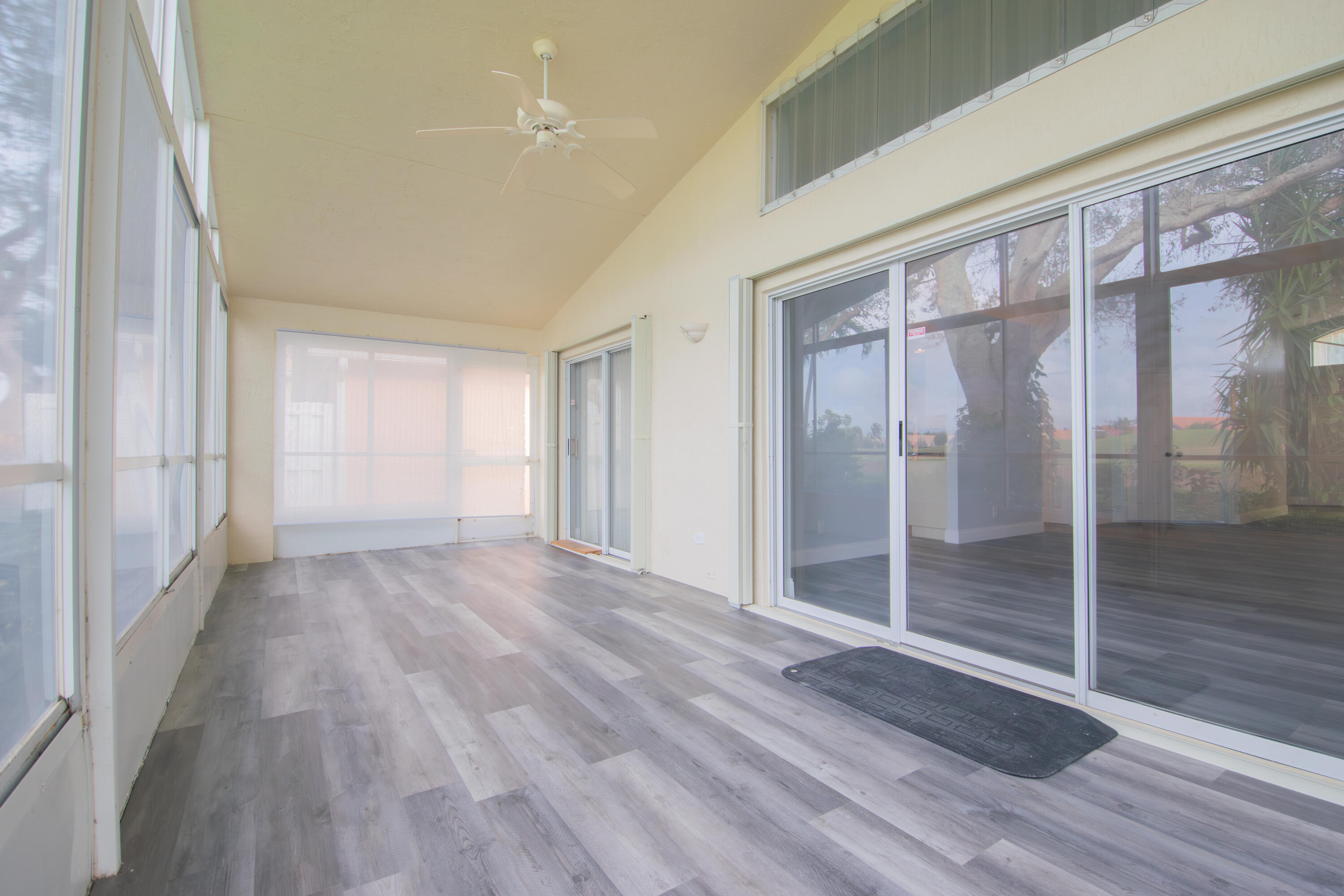 7243 Modena Drive Boynton Beach, FL 33437 - Photo 14 of 28 a view of entryway with wooden floor
