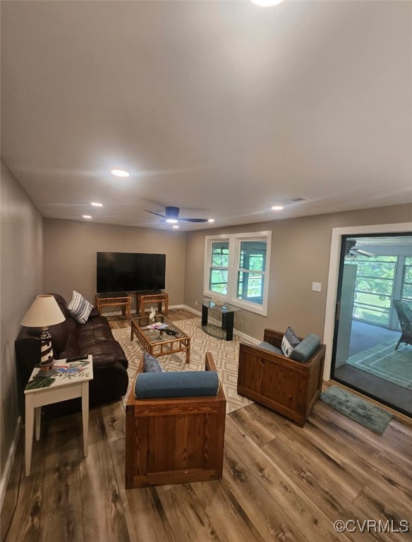 616 Long Point Lane Topping, VA 23169 - Photo 29 of 36 Living room with LVP
floors, plenty of natural l