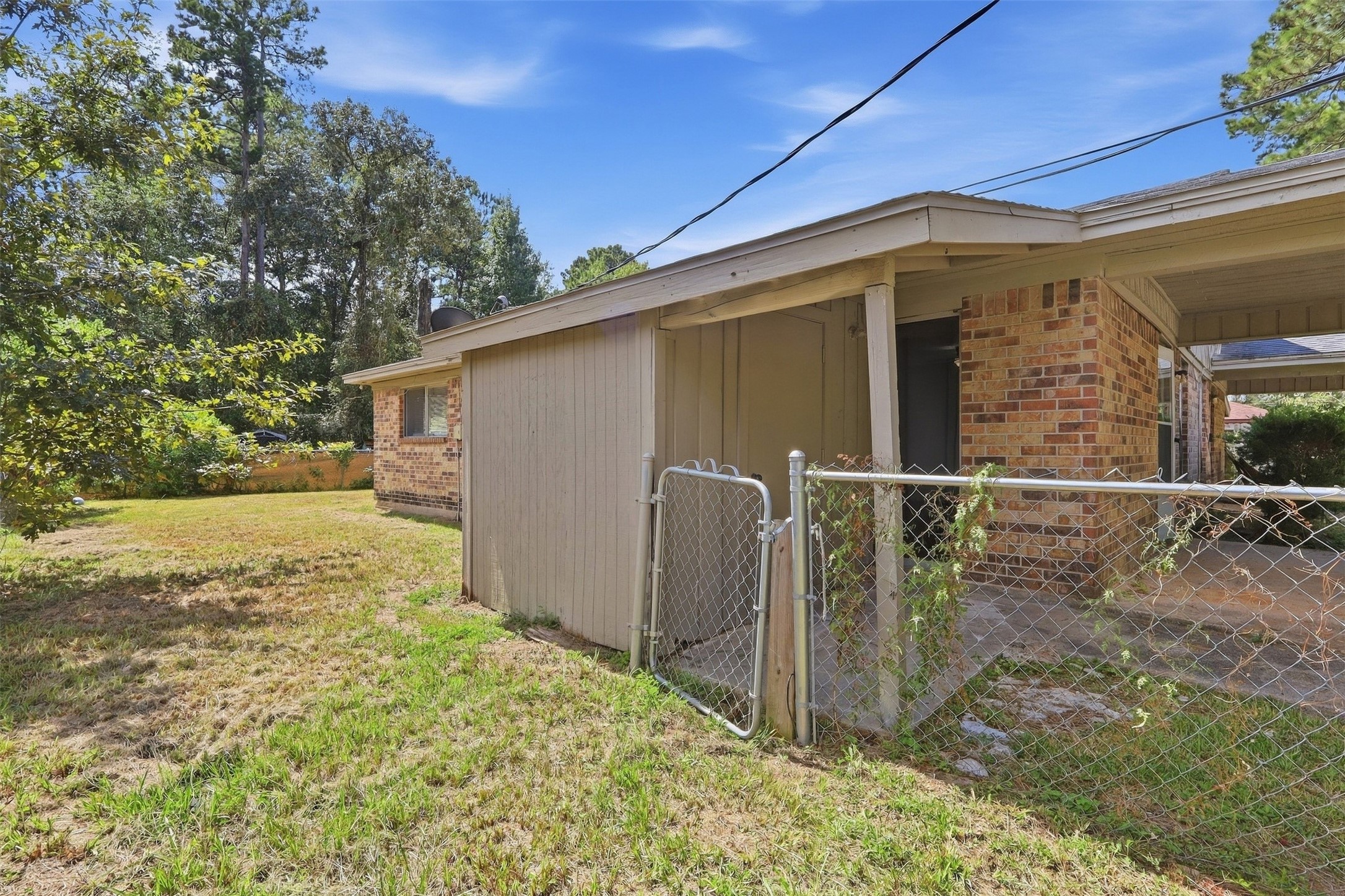 1006 Perry Street Cleveland, TX 77327 - Photo 14 of 14 Side yard