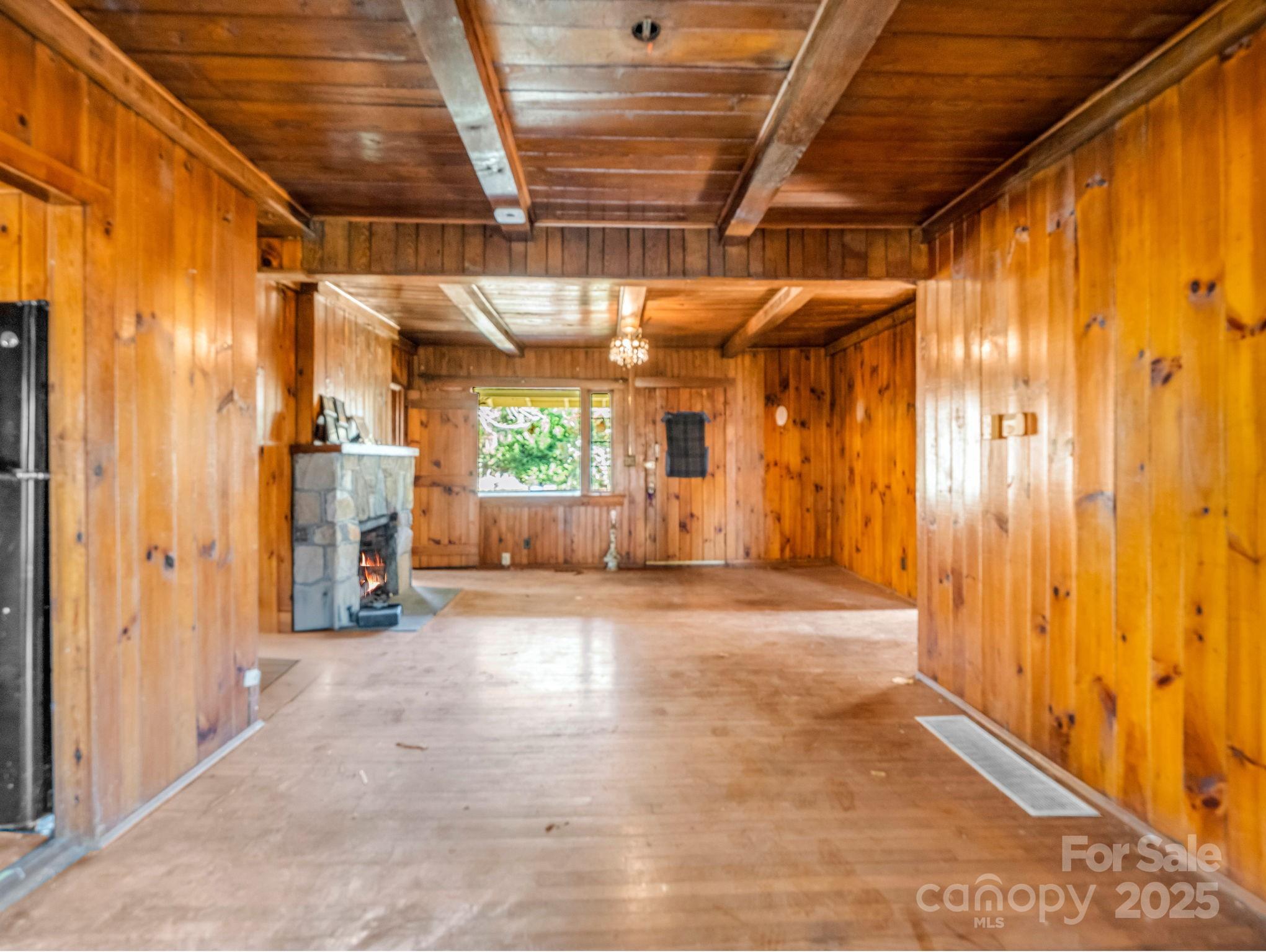 541 Broadway Street Hendersonville, NC 28739 - Photo 22 of 37 a view of hallway with wooden floors and stairs