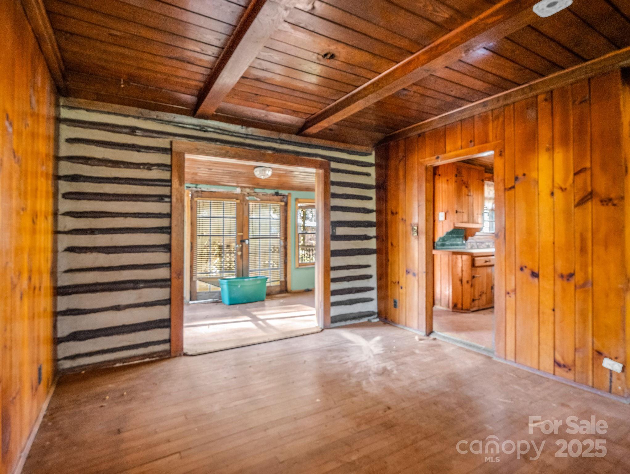 541 Broadway Street Hendersonville, NC 28739 - Photo 23 of 37 a view of a room with wooden walls and stairs