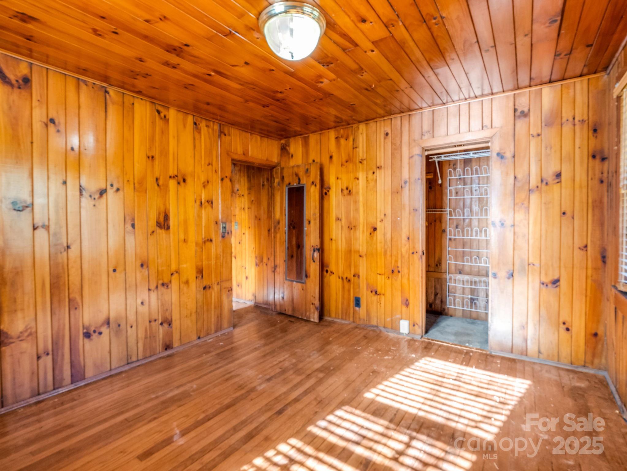 541 Broadway Street Hendersonville, NC 28739 - Photo 33 of 37 a view of entryway with wooden floor