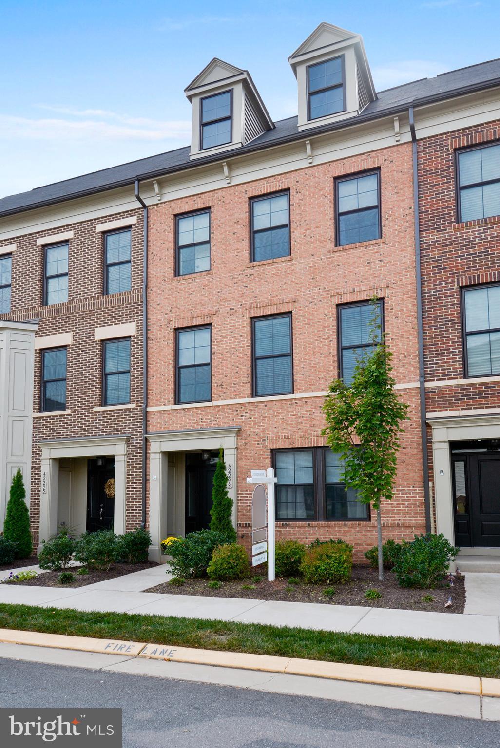42293 Riggins Ridge Terrace Ashburn, VA 20148 - Photo 1 of 27 Brick Front Townhome