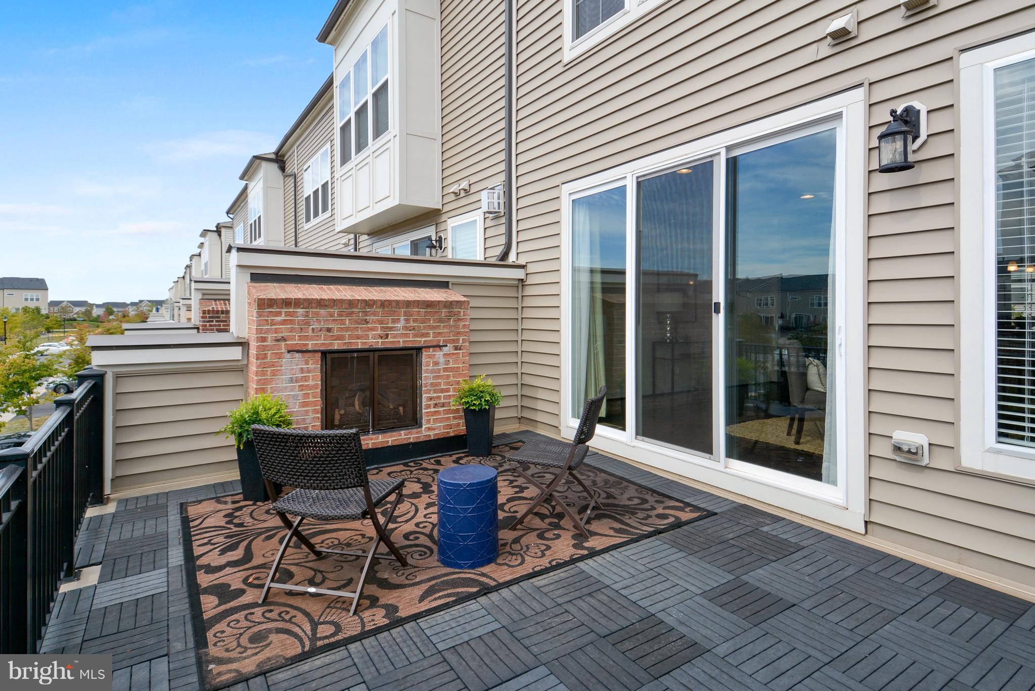 42293 Riggins Ridge Terrace Ashburn, VA 20148 - Photo 4 of 27 Terrace with Gas Fireplace