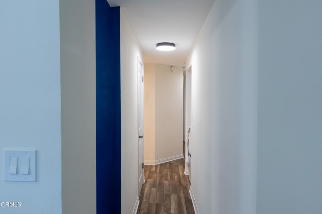 12007 Rochester Avenue, Unit 1 Los Angeles, CA 90025 - Photo 7 of 32 a view of hallway with wooden floor