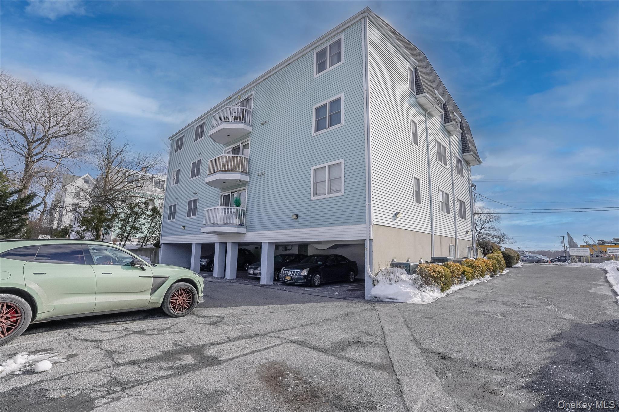 37 Harbor Lane, Unit 2C New Rochelle, NY 10805 - Photo 14 of 17 a view of a cars parking space