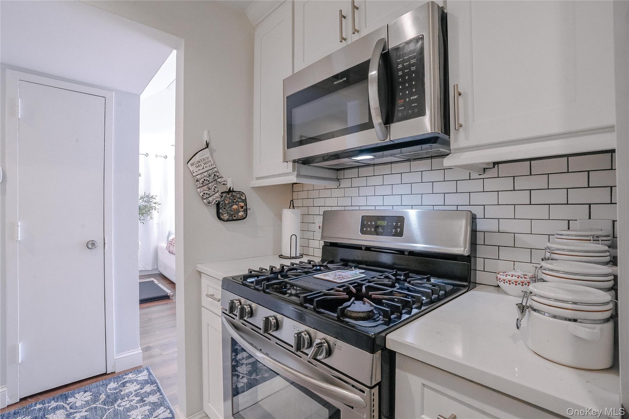 37 Harbor Lane, Unit 2C New Rochelle, NY 10805 - Photo 8 of 17 a stove top oven sitting inside of a kitchen