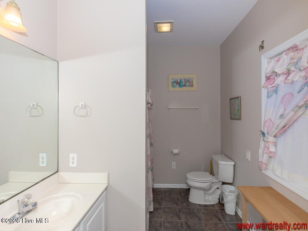 201 South Anderson Boulevard Topsail Beach, NC 28445 - Photo 11 of 32 201 S Anderson1st Floor Hall Bathroom