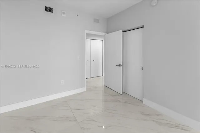 a view of a city with tall buildings