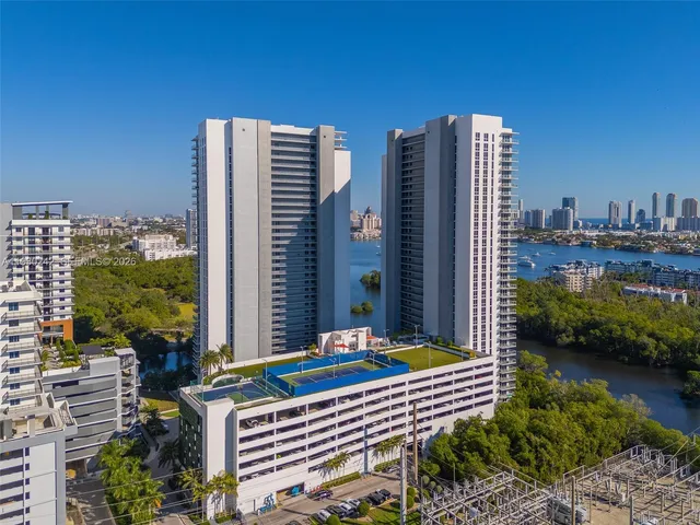 a view of a city with tall buildings