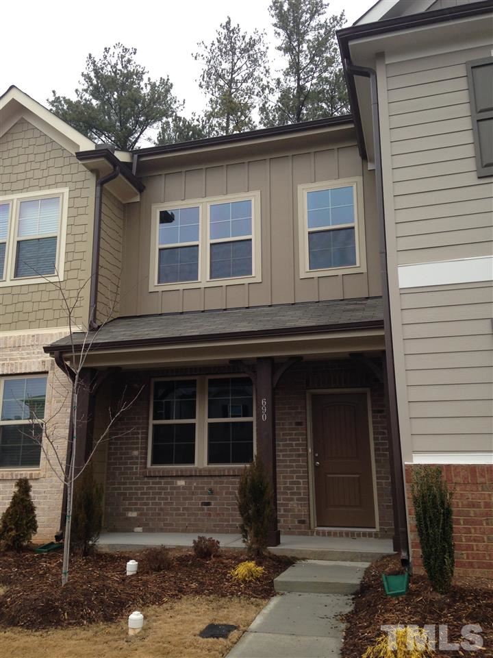 690 Wickham Ridge Road, Unit 141 Apex, NC 27539 - Photo 3 of 25 a front view of a house