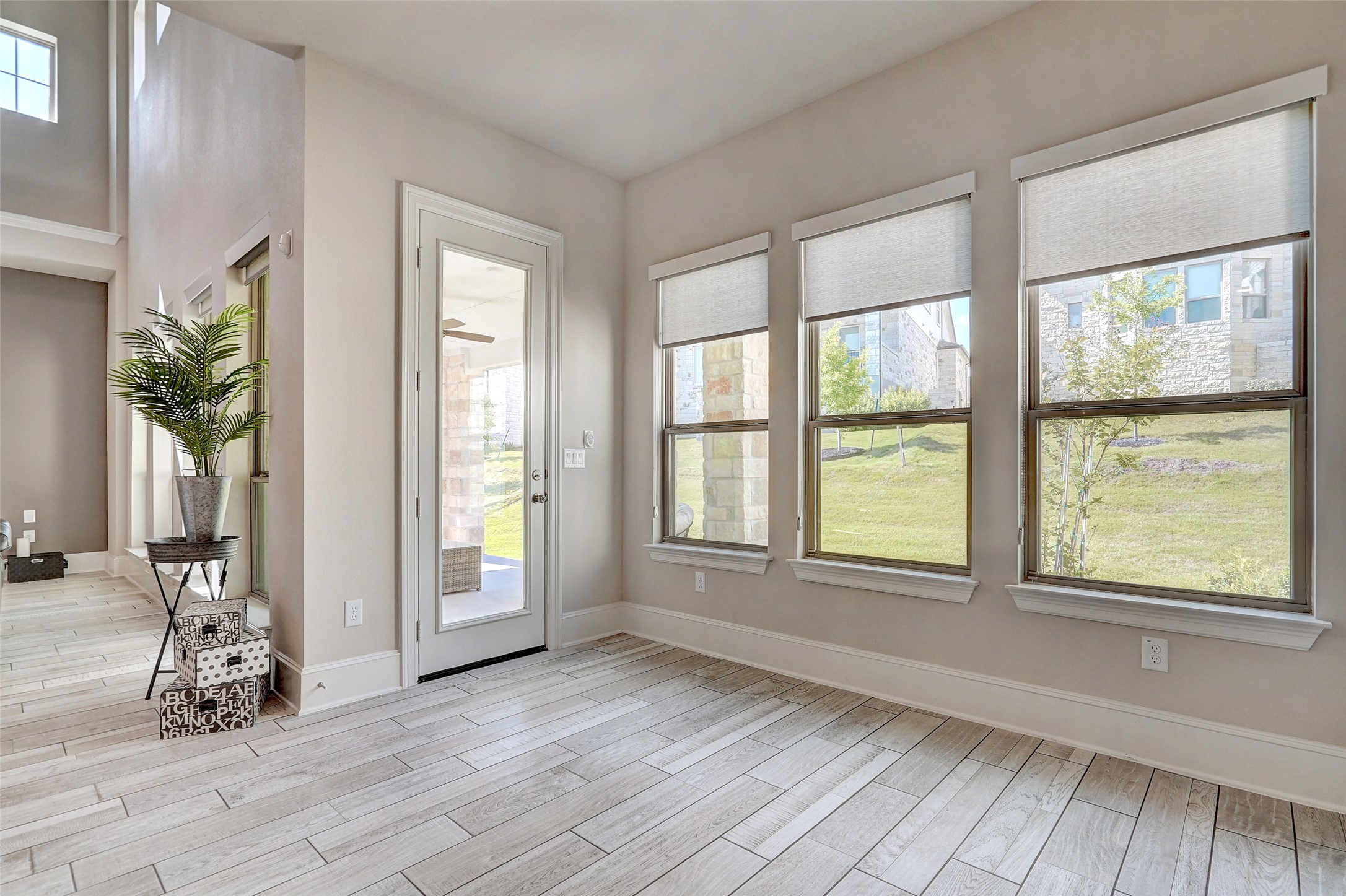 720 Rawson Bend Austin, TX 78738 - Photo 14 of 40 Foyer featuring wood finish floors and baseboards