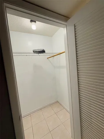 a bathroom with a sink and a shower