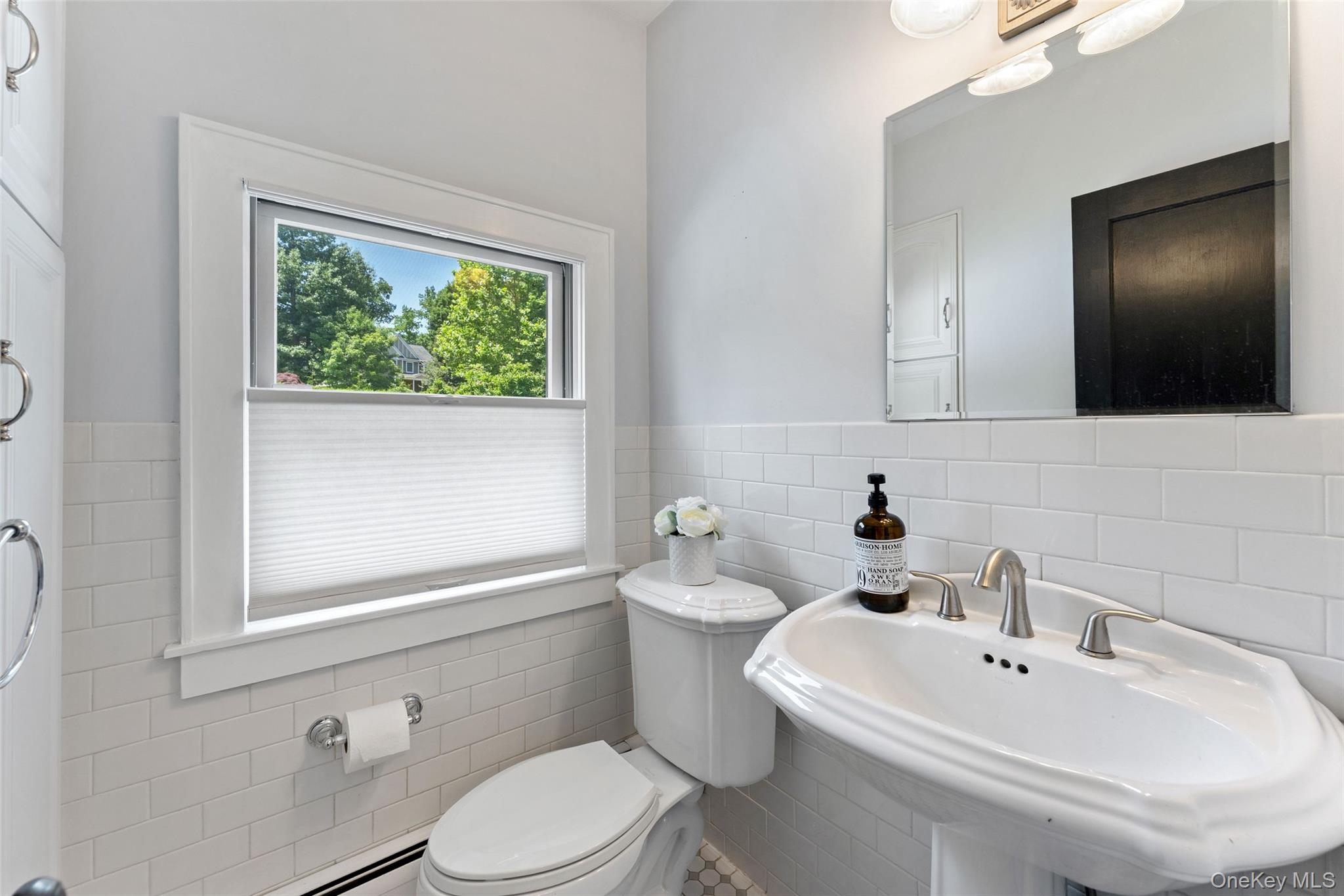211 Strawtown Road West Nyack, NY 10994 - Photo 24 of 47 Powder room off butler's pantry.