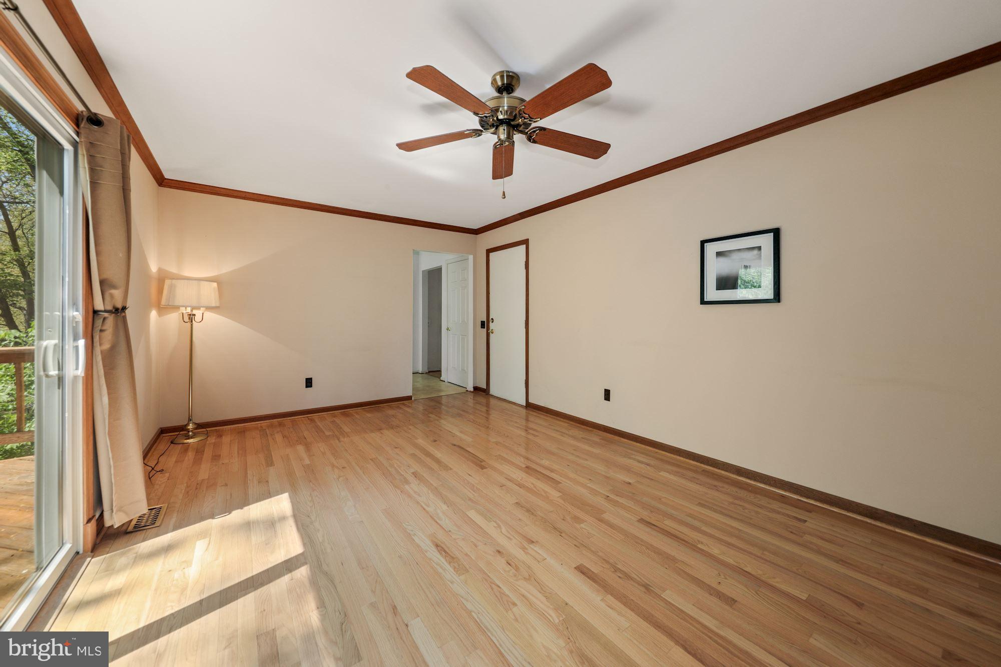 11321 Classical Lane Silver Spring, MD 20901 - Photo 16 of 35 a view of a livingroom with a ceiling fan