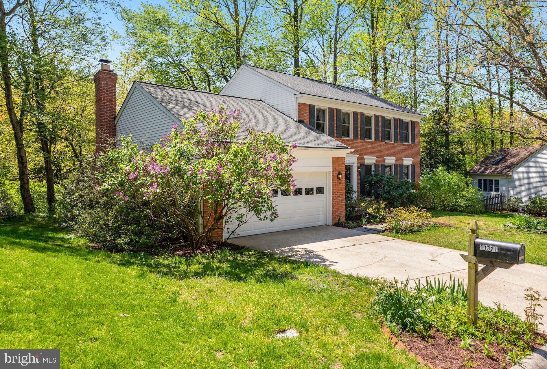 11321 Classical Lane Silver Spring, MD 20901 - Photo 3 of 35 a view of a house with a yard and sitting area