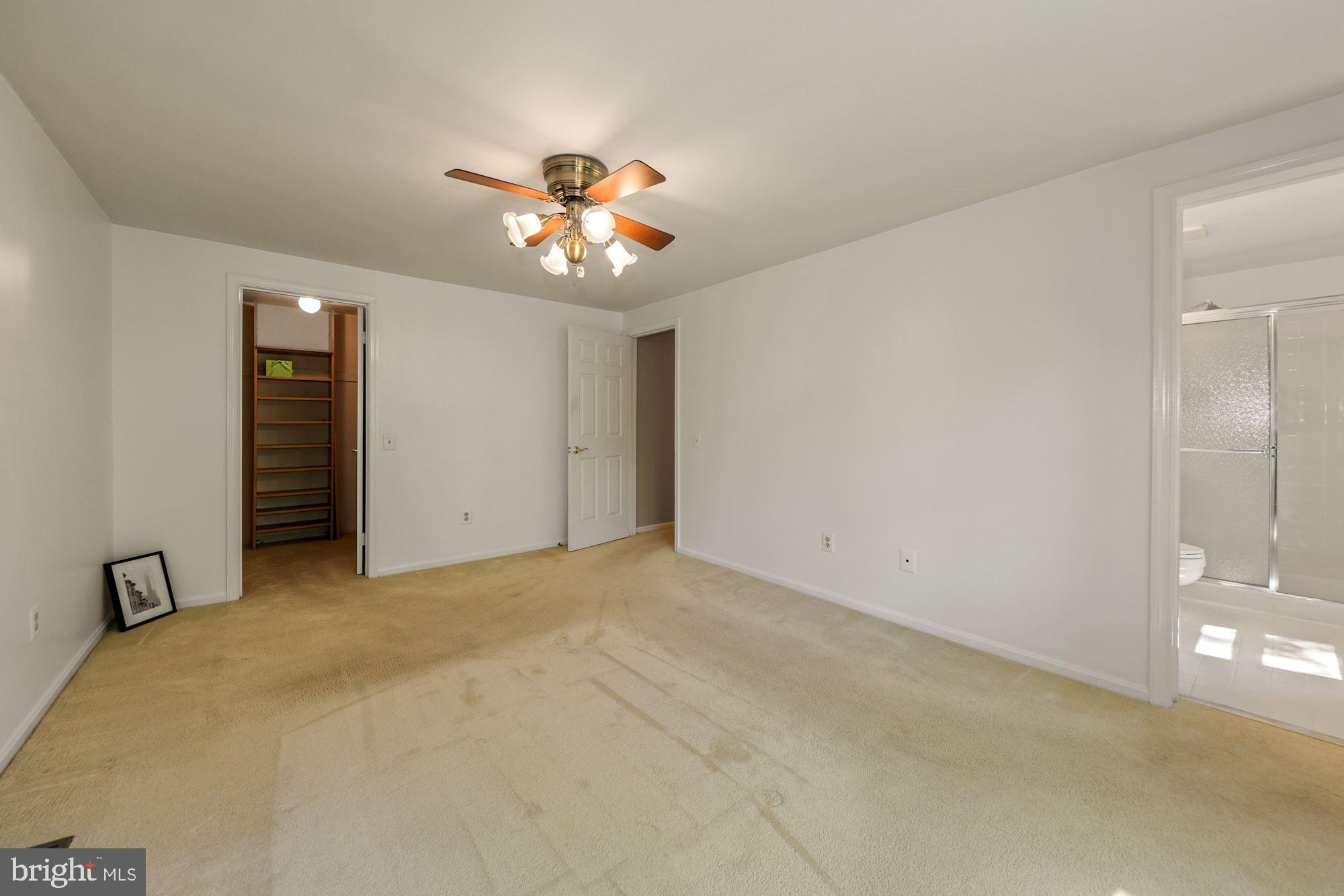 11321 Classical Lane Silver Spring, MD 20901 - Photo 22 of 35 a view of an empty room with a window