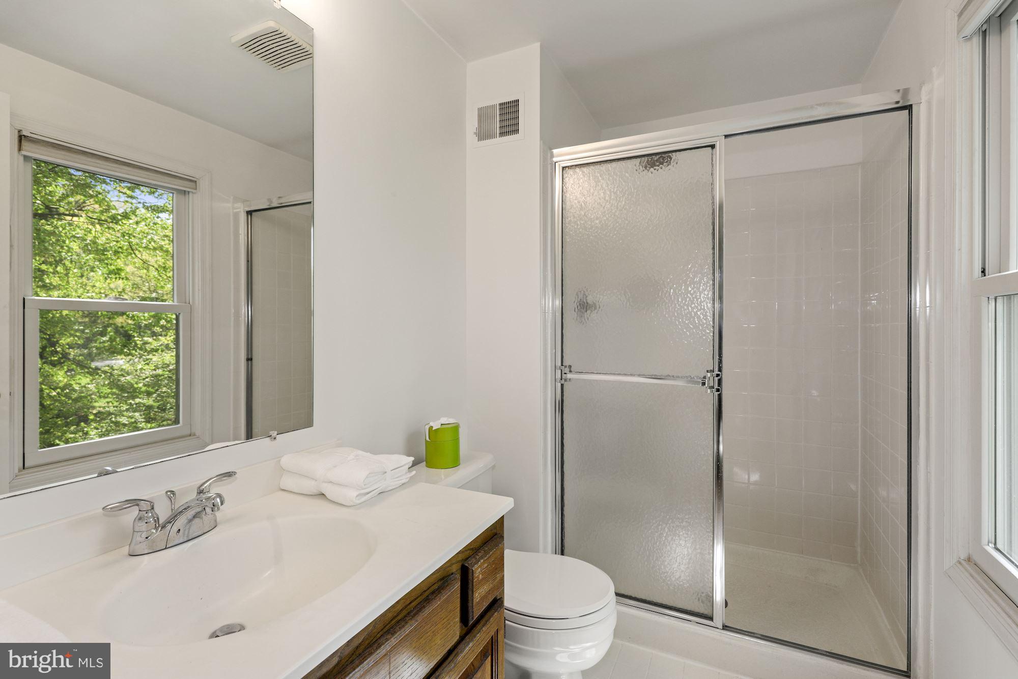 11321 Classical Lane Silver Spring, MD 20901 - Photo 23 of 35 a bathroom with a sink toilet and shower