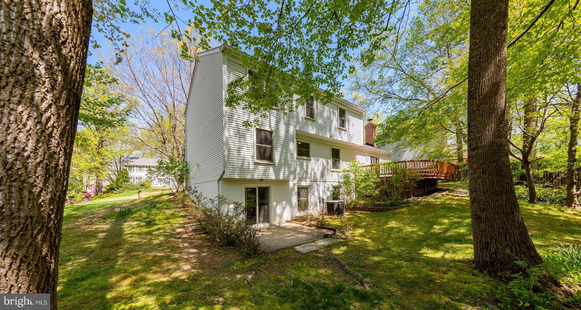11321 Classical Lane Silver Spring, MD 20901 - Photo 32 of 35 a front view of a house with a yard